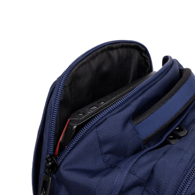 A navy blue backpack with a zippered opening, revealing a device inside and featuring a logo.