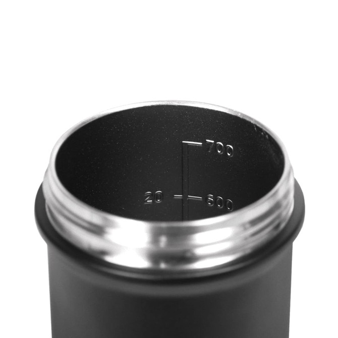 A drink bottle with a black exterior and a stainless steel interior, featuring measurement markings inside.