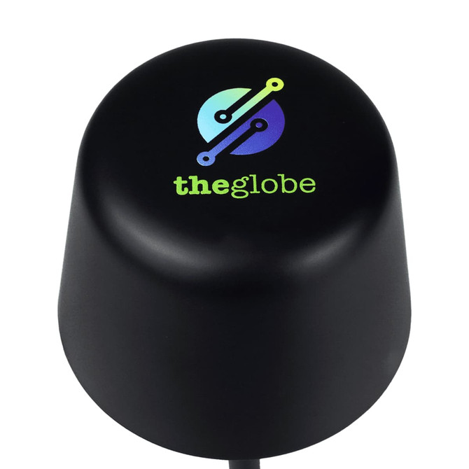 A black, rounded lamp with a logo on top, featuring blue and green colours. It is small and rechargeable.