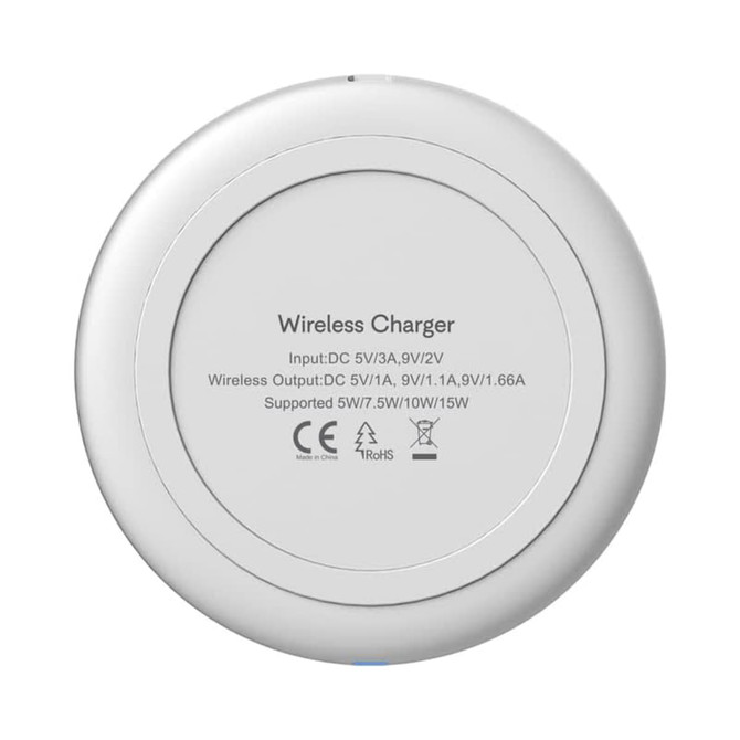 A round, white wireless charger with a smooth surface and a logo on the underside.