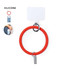 A red silicone phone stand with a metal clip. Includes a circular design and a small holder for the device.