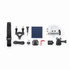 A set of camera accessories including a strap, mounts, cables, cleaning cloth, and various connectors, arranged neatly.