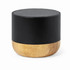 A speaker made of recycled aluminium and bamboo, featuring a black top and a natural bamboo base.
