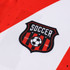 A red and white football jersey featuring a shield-shaped logo with soccer elements.