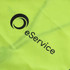 A hi-vis vest in bright yellow with horizontal reflective tape and a logo on the front.