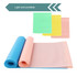 Fitness resistance bands in blue, pink, green, and yellow colours, rolled and flat, featuring a logo.
