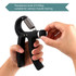 A hand holding a black adjustable hand grip with a metallic spring, featuring a resistance dial.
