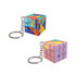 A set of colourful 3x3 puzzle cubes attached to keyrings, featuring vibrant geometric designs in blue, pink, and yellow.