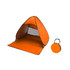 An orange pop-up beach tent with a rounded canopy and a matching compact carry bag.