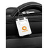 A white ABS luggage tag attached to a black suitcase with a logo. The tag has spaces for a name and address.