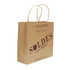 A twisted handle kraft paper bag in brown with polka dots and a logo, featuring a promotional design and text.