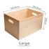 A large wooden storage box in a natural finish, featuring cut-out handles and precise measurements displayed.