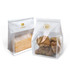 Two clear storage bags displayed, one containing a loaf of bread, the other filled with croissants, both featuring logos.