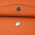 An orange PU leather A4 file bag featuring a snap closure and a textured interior. It includes a logo detail.
