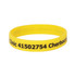 A yellow silicone wristband featuring black text and a logo, promoting a clinic in Cherbourg.