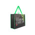 A black laminated non-woven trade show bag with green accents and a leafy design. Features sturdy handles and logo branding.