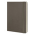 A large, dark green Moleskine classic hard cover notebook with an elastic band closure.