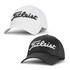 A white and a black cap featuring a branded logo, designed for performance and comfort.
