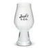 A clear glass beer glass with a wide bowl and a tapered base, featuring a logo.