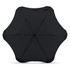A black BLUNT Metro UV umbrella with a unique sculpted shape and a central button mechanism. It features branding.