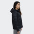 A black puffer jacket with a hood, featuring a quilted design and a side view of a model wearing it.
