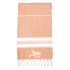 A 100% cotton Turkish towel in a warm orange hue with white stripes and frayed edges, featuring a logo.