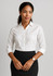 A white women's button-up shirt with 3/4 sleeves, paired with a black skirt and a watch. Features branding.