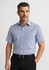 A short-sleeve button-up shirt in light blue, featuring a collar and a logo on the chest. Worn with black trousers.