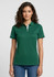 A green women's short sleeve polo shirt with a collar and branding, paired with light blue jeans.