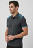 A grey men's short sleeve polo with blue accents and a textured design on the shoulders, featuring a logo.