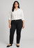 A pair of women's slim leg stretch chino pants in black, worn with a white shirt and black flats. The model has a logo on the pants.