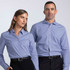 A blue check button-up shirt for men and women, featuring a collar and buttons, with a logo present.