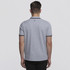 A grey polo shirt with contrasting trim and a logo on the back, featuring a classic collar and short sleeves.