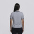 A grey women's polo shirt with a classic collar and contrasting piping, featuring a logo on the back.