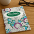A5 colouring book featuring intricate floral designs in purple, blue, and green, with a logo on the cover.