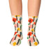 Colourful socks featuring various shapes and a logo pattern in hues of yellow, green, red, and orange.