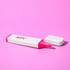 A pink eco-friendly highlighter with a white speckled casing and a removable cap, featuring a logo.