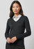 A women's Milano pullover in black, featuring a V-neck design and long sleeves, worn over a collared shirt.