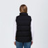 A black puffa vest with a high collar, featuring a branding logo, viewed from the back.