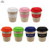 A range of reusable coffee cups in various colours, featuring a logo and silicone lids in contrasting shades.