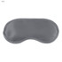 A grey satin sleep eye mask with a smooth surface and curved shape, featuring a logo on the side.