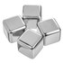 A set of four silver stainless steel ice cubes with a smooth finish, designed for chilling beverages.