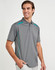 A grey men's polo shirt featuring contrast turquoise detailing and a logo. Short sleeves and a classic collar design.