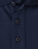 A navy blue polo shirt featuring three buttons and a collar, with a logo on the fabric.