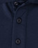 A close-up of a navy blue polo shirt featuring a button placket and a small logo.