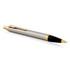 A brushed stainless steel ballpoint pen with gold accents and a black tip, featuring a branding logo.