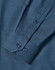 A blue men's long sleeve button-up shirt featuring a pin dot pattern and buttoned cuffs.