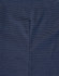 A close-up of a navy blue fabric with a pin dot pattern, showcasing the texture of the shirt.