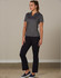 Ladies' utility cargo pants in black, paired with a grey polo shirt, model standing in a neutral setting.