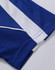 A close-up of a blue polo shirt featuring white striped detailing and a branded label.